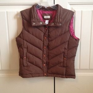 Brown vest.