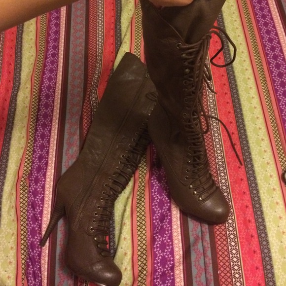 Brown knee high lace up boots