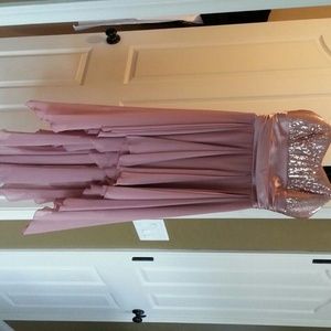 Dark pink homecoming dress with sequins.