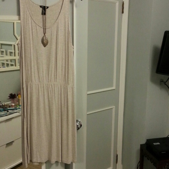 Beige cotton dress with synched waist