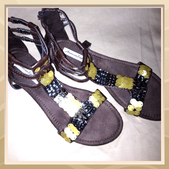 Brown gladiator sandals.