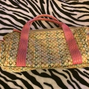 Multi-color purse with pink handle