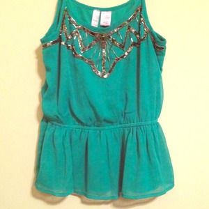 Green peplum-style embellished top