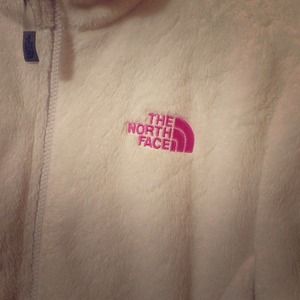 White fleece North Face jacket.