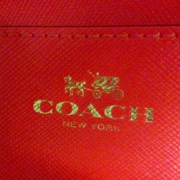 ⬇️⬇️Authentic Coach clutch/tablet case.