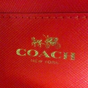 ⬇️⬇️Authentic Coach clutch/tablet case.