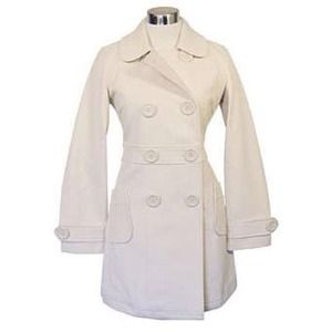 White women's peacoat with white buttons.