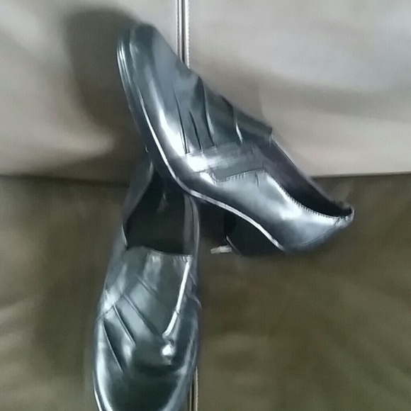 Clarks black slip on shoes