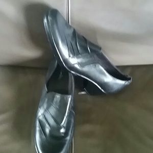 Clarks black slip on shoes