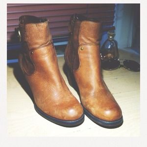 Distressed Naturalizer brown boots.