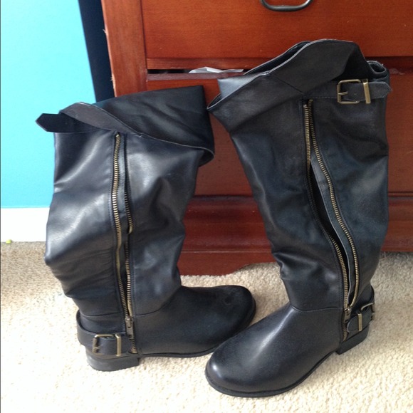 Black knee high boots.