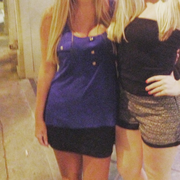 Blue tank top with gold buttons