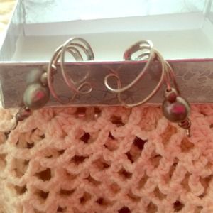 Wrap around silver and pearl earrings.