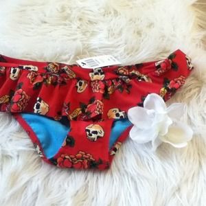 Ruffle bottom swim suit red retro with skulls