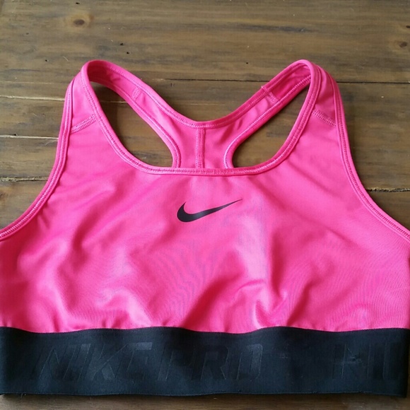 Hot pink and black nike sports bra