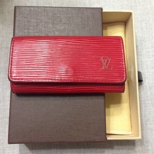 Authentic Louis Vuitton red epi 4 key holder
