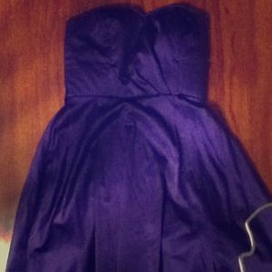 Purple knee length homecoming dress
