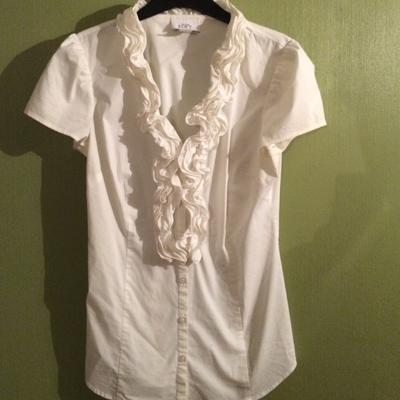 White ruffle blouse