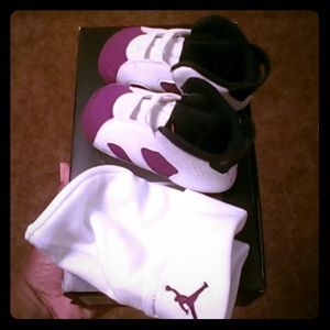 Purple & white jordans 6's