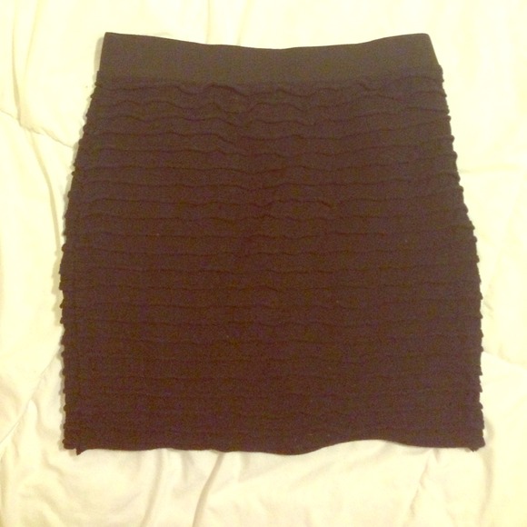 Above the knee stretchy mini black cotton skirt