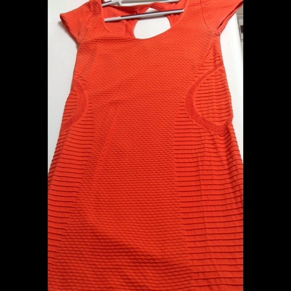 BEBE Orange bandage dress
