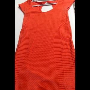 BEBE Orange bandage dress