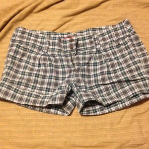 Plaid shorts, yellow shorts.