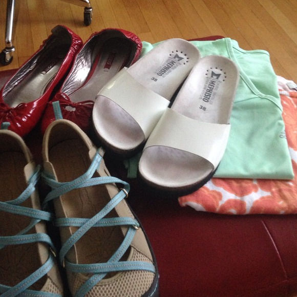 Bundle of three pairs of shoes two blouses.