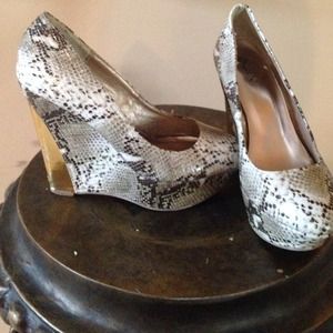 Brown and creme wedge shoes