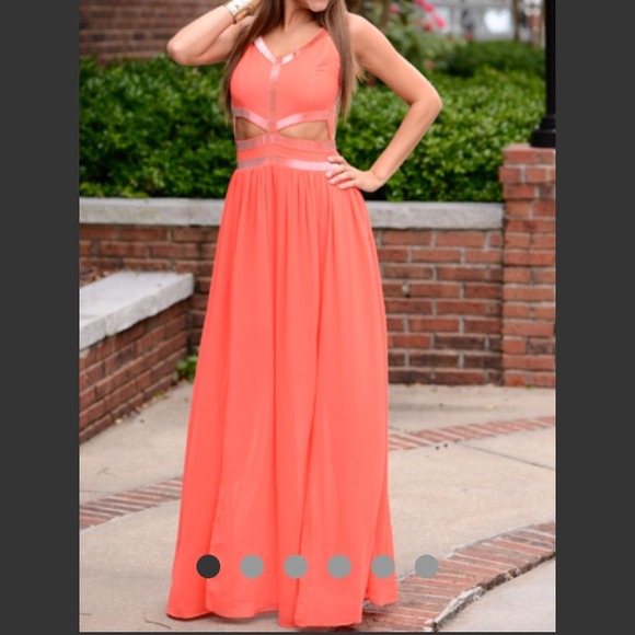 Beaded dress with cutouts in the back and abs!