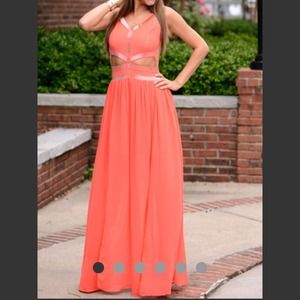 Beaded dress with cutouts in the back and abs!