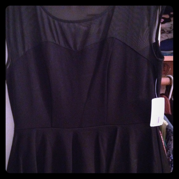 Short black peplum dress