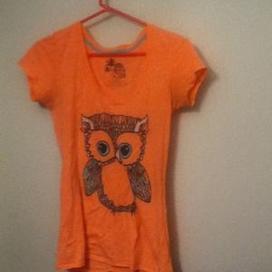 Neon orange owl tee shirt.
