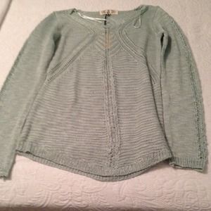 A Turquoise Sweater