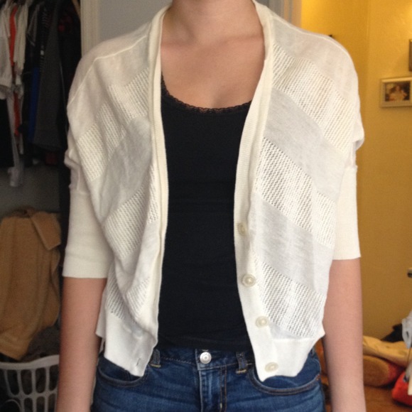 Sheer cream colored shrug.