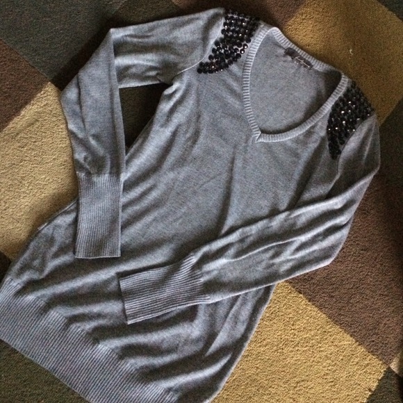 Grey long sleeve with beads.