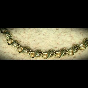 0ver 40 yrs old, necklace, worn lose or choker.