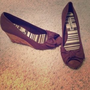 Brown wedges with wood-type heel.