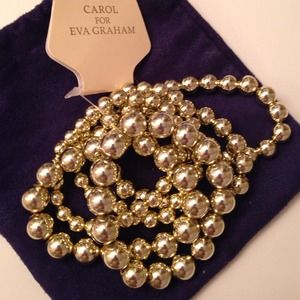 Carol for Eva Graham pack of gold beaded bracelets