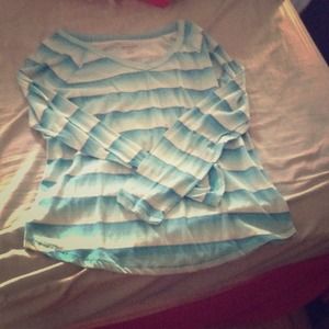 Long sleeved, blue and white shirt