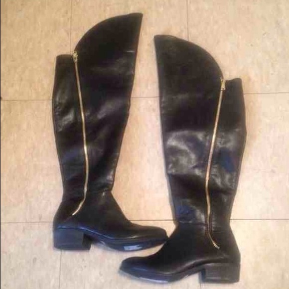 Report Knee boots