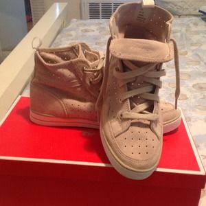 New Coach sneakers. Worn only for a few hours!!