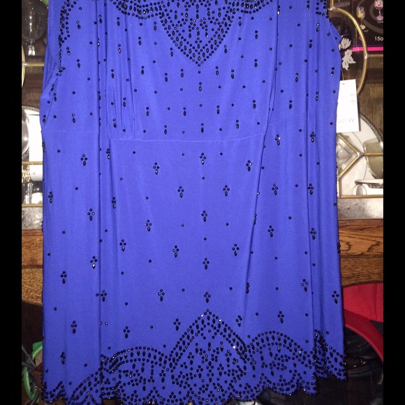 Sold: three tops