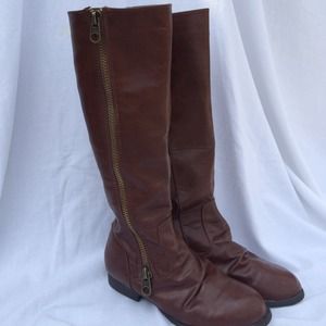 Tall right below the knee brown boots.