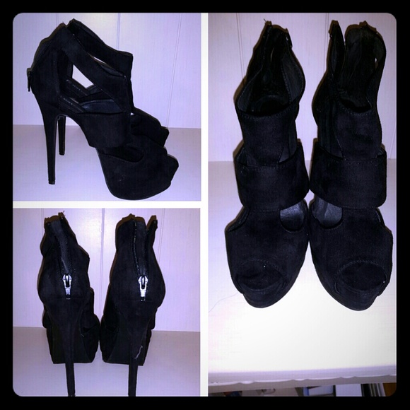 Sold Never worn. NWOT! Black suede heels!