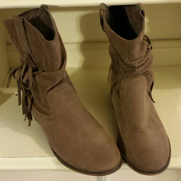 Fringed bootie with a suede feel. Not real suede.