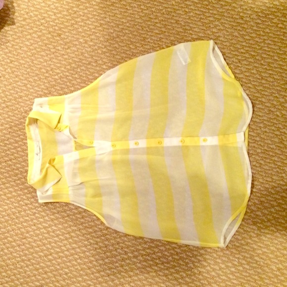 Sleeveless yellow/white stripe button down.