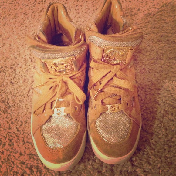 A pair of Michael Kors sneakers