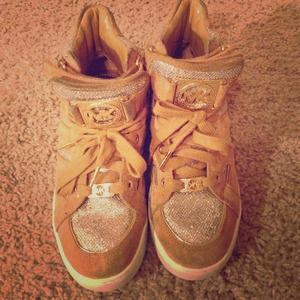 A pair of Michael Kors sneakers