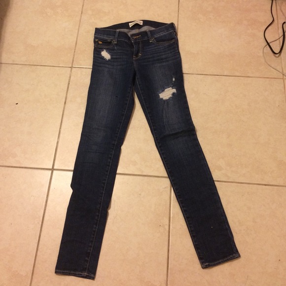 Dark wash, distressed jeans